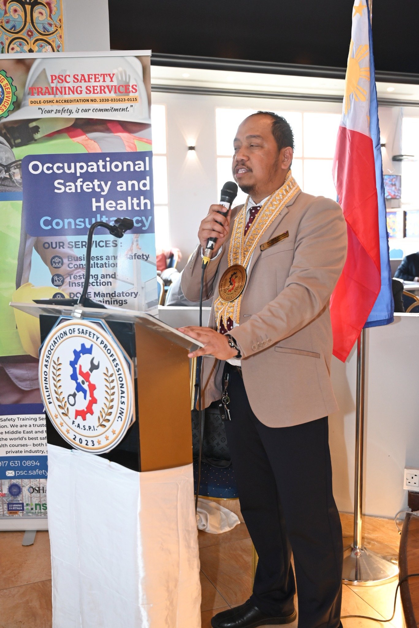 FASPI safety professional speaking during an occupational safety and health event
